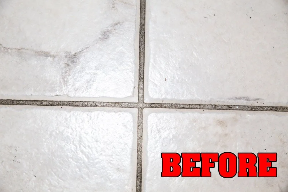 dirty stained tile floor before steam mop cleaning