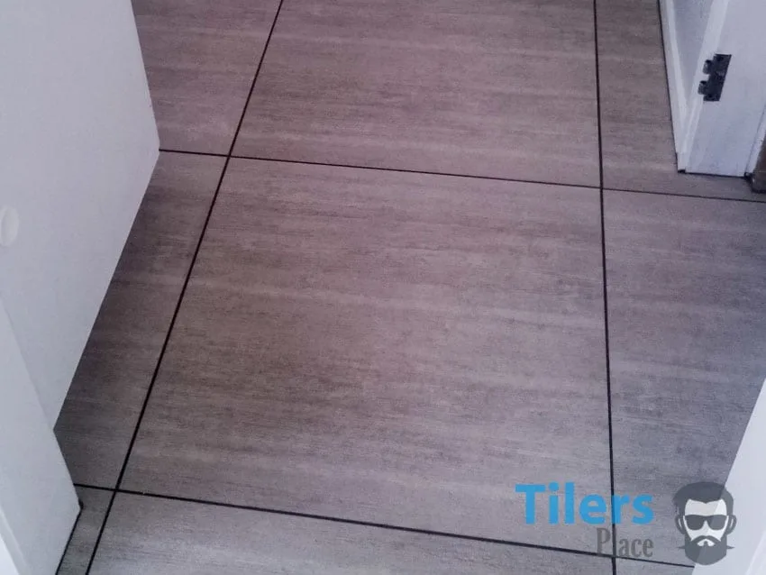 Clean tiled surface without grout haze.