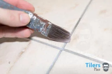 Distributing grout sealer